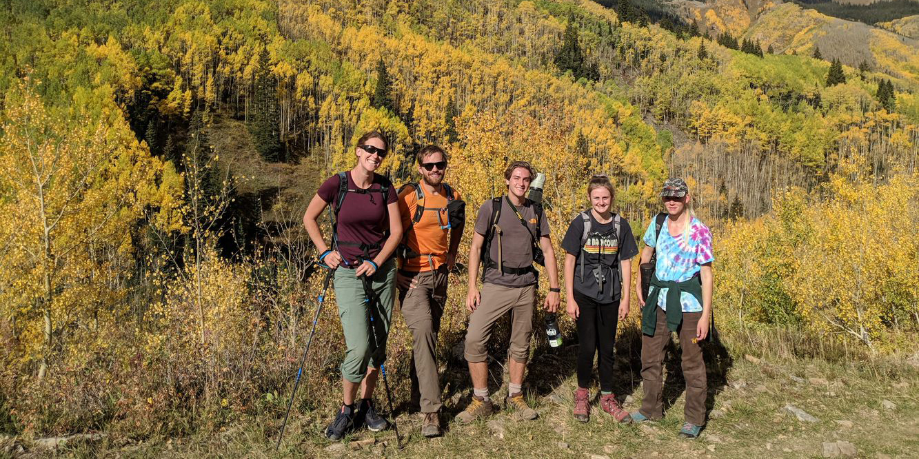 Students backpacking on a fall hike
