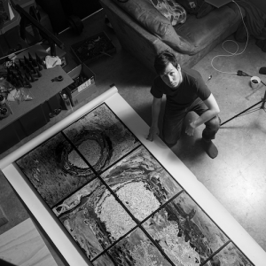 A photo of Kei Ito in his studio, as seen from above.