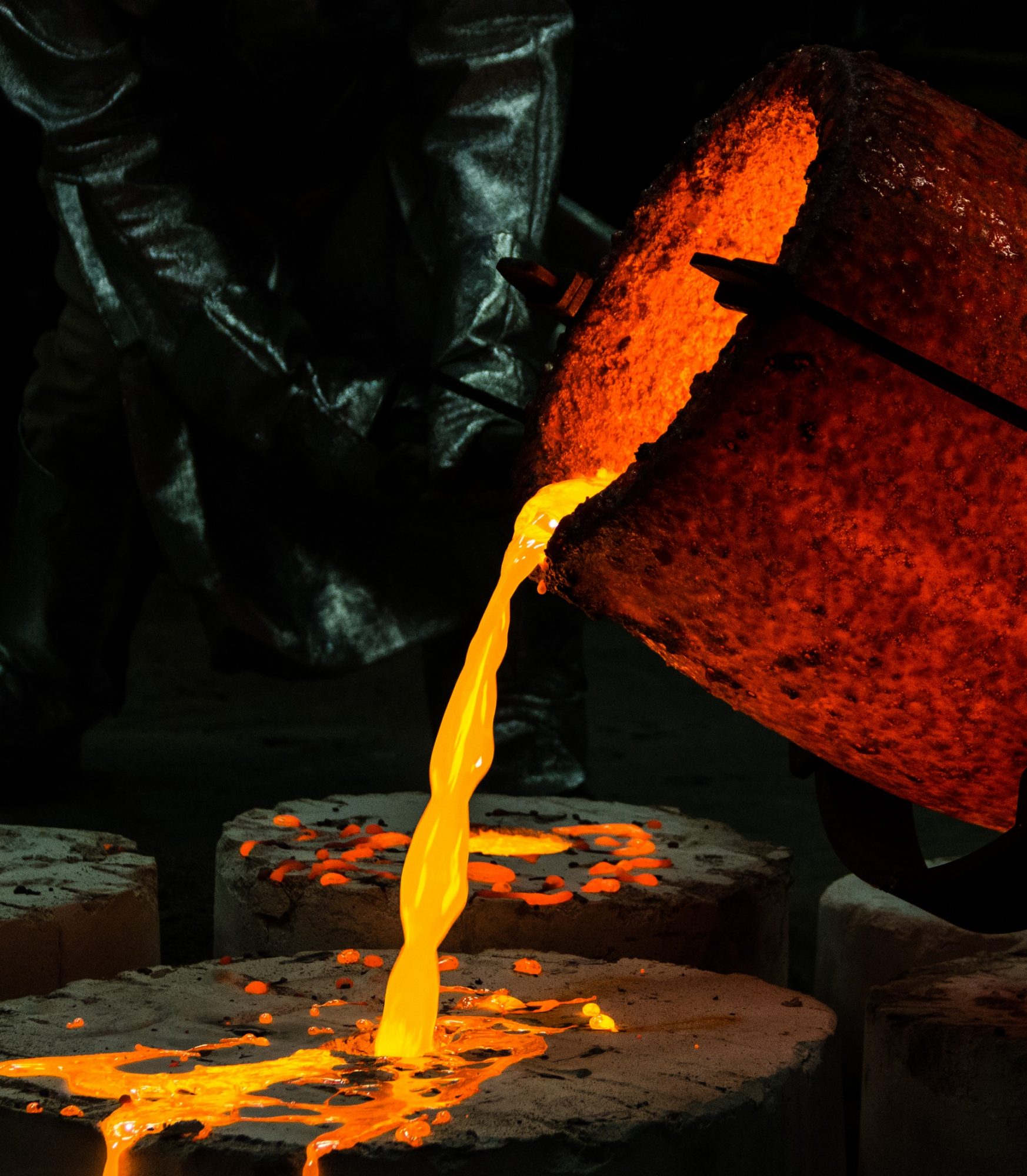 molten glass pouring into mold