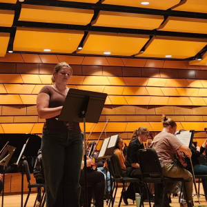 Lindsey Zamboni-Cutter reads a poem at CSU music event featuring student poetry.