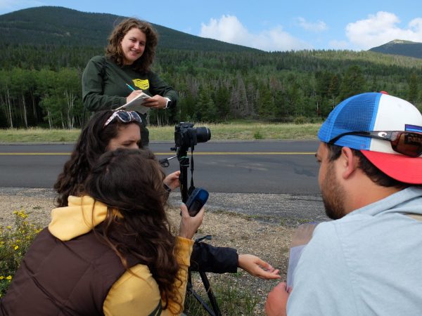 Students working with a camera at Rocky Mountain National Park