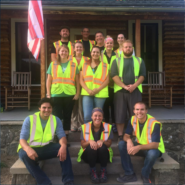 Students and faculty standing on the steps at McGraw Ranch