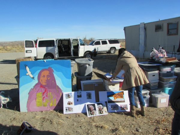 images of Mark Soldier Wolf outside his daughters home