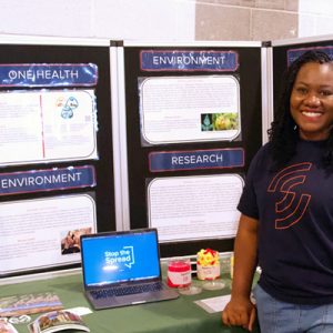 Ph.D. Candidate Joy Enyinnaya set up a kid- and family-friendly booth at El Paso’s local county fair to share what herd immunity looks like, how viruses spread, and the importance of getting vaccinated for a community’s overall well-being.