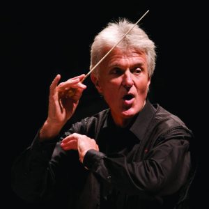 Simon Carrington conducting Promotional Photo