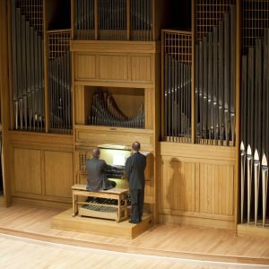 Joel Bacon pictured playing the Organ Recital Hall Casavant organ