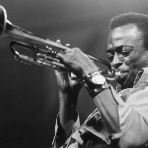 American jazz musician and composer Miles Davis (1926 - 1991) playing the trumpet.