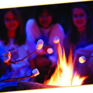 Students pictured roasting marshmallows
