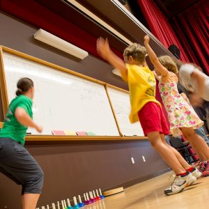 Student pictured teaching Dalcroze Music and Movement class