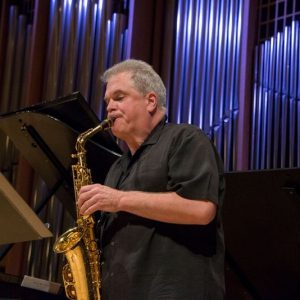 Dan Goble pictured playing the saxophone