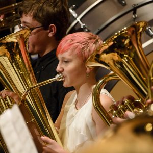 A female middle school euphonium player pictured