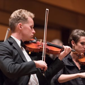 Violin students pictured performing
