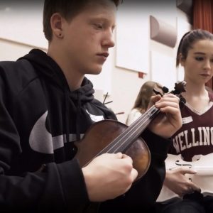 Students practicing the violin