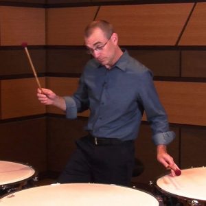 Eric Hollenbeck Playing Drums Promotional Photo