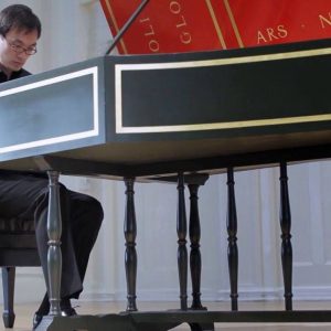 Jason Moy playing harpsichord