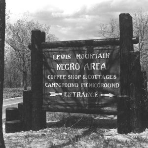 A large wood sign outside of Lewis Mountain, a segregated campground at Shenandoah National Park.