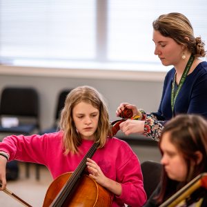 Cello student with CSU music ed student