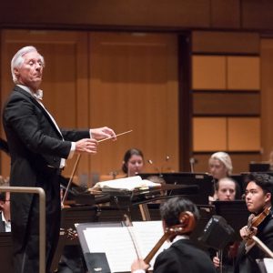 Maestro Wes Kenney pictured conducting the University Symphony Orchestra