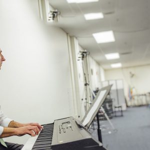 music therapy session with a keyboard pictured