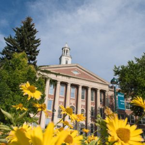 University Center for the Arts building with flowers in front