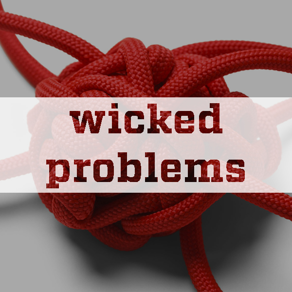 knot with wicked problems text overlay