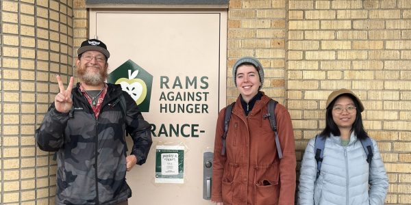 Downing and students at pantry door