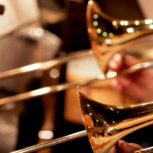 Close up of trombones playing