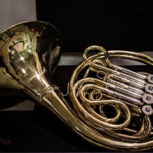 A French Horn pictured on chair