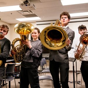 CSU music ed student with middle school tuba players