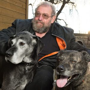 Bernie Rollin at home with dogs.