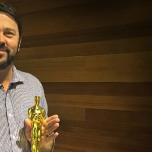 Jeff Werner holds his company's Oscar rewarded for Best Visual Effects