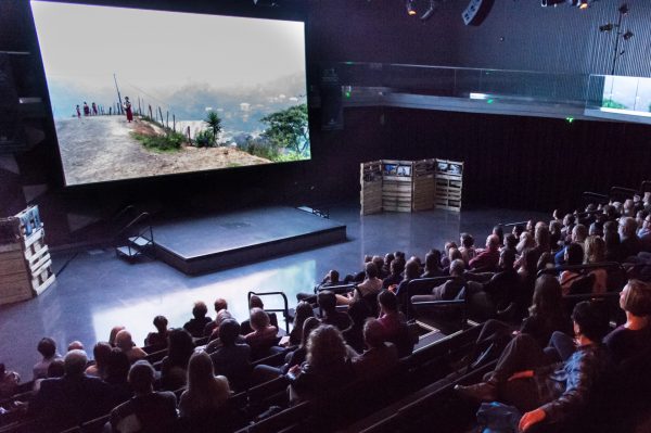 Festival guests watch a movie in the LSC Theater