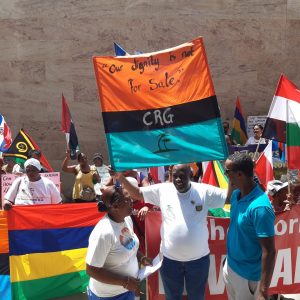 Protestors holding signs