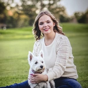 Kennedy Reister with her dog