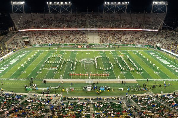 The CSU Marching Band spells "Ann Gill" on the field at a CSU Football game to honor the late dean and share the announcement of the newly named Ann Gill Hall