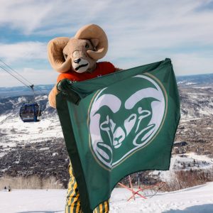 CAM with a CSU flag on a mountain top