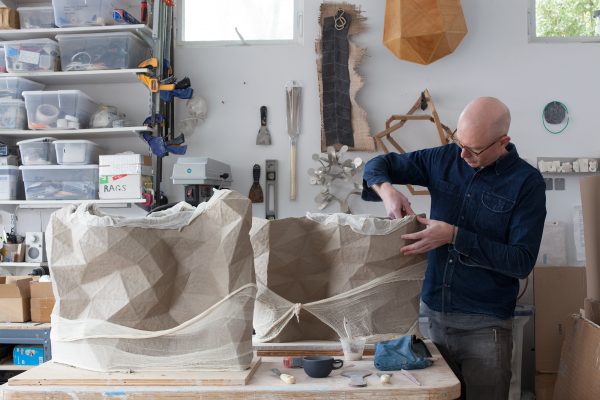 Del Harrow using a 3D printer to assist in his pottery craft
