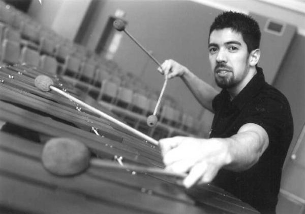Danny Canete playing the xylophone.